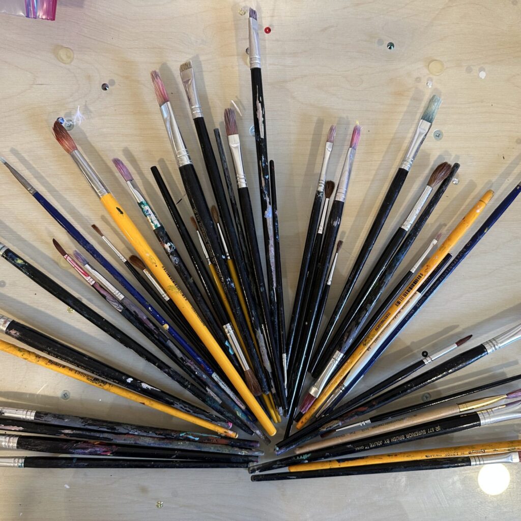Paintbrushes in a fan layout.